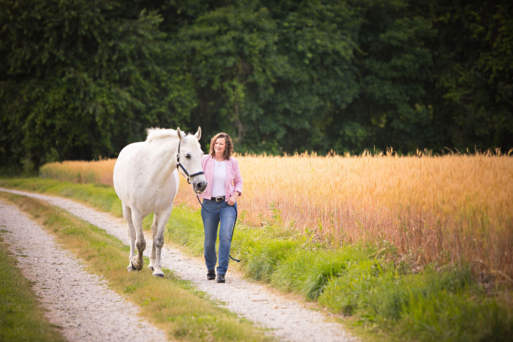 Kristen and Elephant walking together